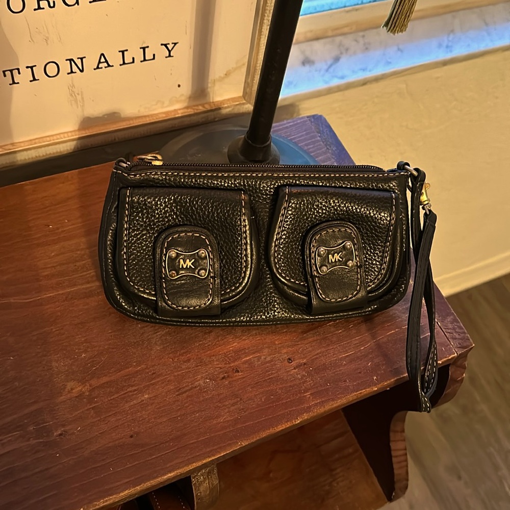 Black leather Michael Kors wristlet